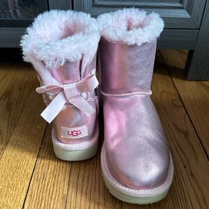 Pink Bailey Bow Ugg, size 7. Worn twice, like new. Minor marks as seen on pics